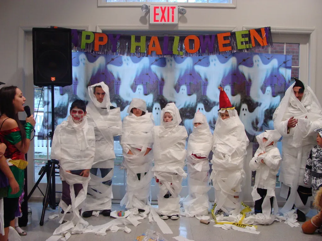 Halloween Activities For Kids Mummy wrap race